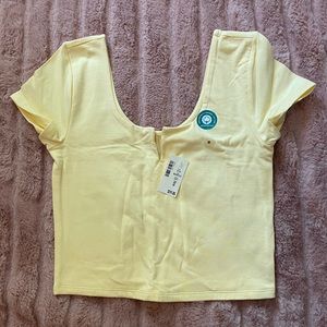 A yellow crop top